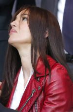 MONICA BELLUCCI at Paris SG vs FC Barcelona Game at Parc Des Princes in Paris