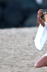 NICOLE SCHERZINGER Taking a Selfie on the Beach in Hawaii