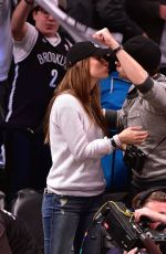 OLIVIA WILDE and Jason Sudeikis at Brooklyn Nets Game in New York