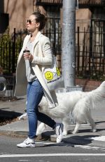 OLIVIA WILDE Walks Her Dog Out in New York