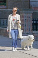 OLIVIA WILDE Walks Her Dog Out in New York
