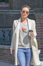 OLIVIA WILDE Walks Her Dog Out in New York