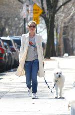 OLIVIA WILDE Walks Her Dog Out in New York
