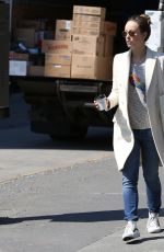 OLIVIA WILDE Walks Her Dog Out in New York