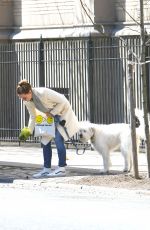 OLIVIA WILDE Walks Her Dog Out in New York