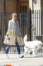 OLIVIA WILDE Walks Her Dog Out in New York