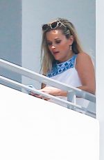 REESE WITHERSPOON at a Hotel Balcony in Miami 04/20/2015