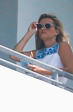 REESE WITHERSPOON at a Hotel Balcony in Miami 04/20/2015
