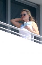REESE WITHERSPOON at a Hotel Balcony in Miami 04/20/2015