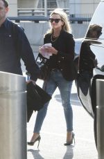REESE WITHERSPOON at JFK Airport in New York