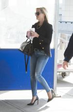 REESE WITHERSPOON at JFK Airport in New York