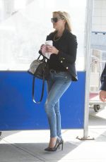 REESE WITHERSPOON at JFK Airport in New York