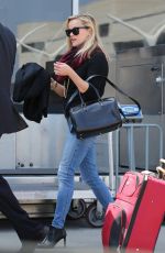 REESE WITHERSPOON in Jeans at LAX Airport in Los Angeles