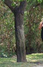 REESE WITHERSPOON with Her Dog Out Jogging in Brentwood