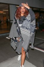 RIHANNA Arrives at LAX Airport in Los Angeles 04/29/2015