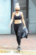 RITA ORA in Tights at LAX Airport in Los Angeles