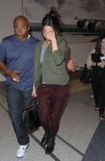 SELENA GOMEZ Arrives at Los Angeles International Airport