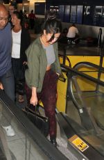 SELENA GOMEZ Arrives at Los Angeles International Airport