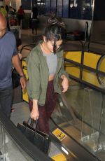SELENA GOMEZ Arrives at Los Angeles International Airport