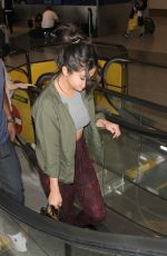 SELENA GOMEZ Arrives at Los Angeles International Airport