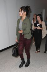 SELENA GOMEZ Arrives at Los Angeles International Airport