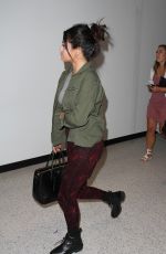 SELENA GOMEZ Arrives at Los Angeles International Airport