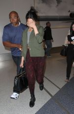 SELENA GOMEZ Arrives at Los Angeles International Airport