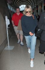 TAYLOR SCHILLING Arrives at LAX Airport in Los Angeles 004/25/2015