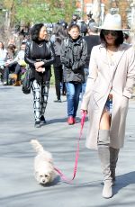 VANESSA HUDGENS Walks Her Dog at Washington Square Park in New York