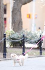 VANESSA HUDGENS Walks Her Dog at Washington Square Park in New York