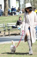 VANESSA HUDGENS Walks Her Dog at Washington Square Park in New York