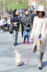 VANESSA HUDGENS Walks Her Dog at Washington Square Park in New York