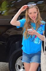 AMANDA SEYFRIED in Jeans Shorts Arriving at Her Hotel in New York 05/04/2015