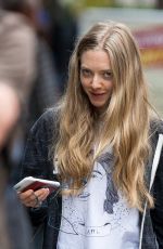 AMANDA SEYFRIED Out with Her Dog Finn in New York 05/18/2015