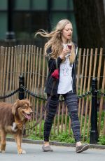 AMANDA SEYFRIED Out with Her Dog Finn in New York 05/18/2015
