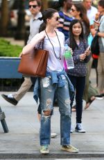 ANNE HATHAWAY in Ripped Jeans Out and About in Manhattan 05/08/2015