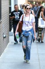 ANNE HATHAWAY in Ripped Jeans Out and About in Manhattan 05/08/2015