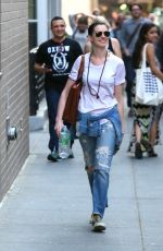 ANNE HATHAWAY in Ripped Jeans Out and About in Manhattan 05/08/2015