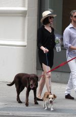 ANNE HATHAWAY Walks Her Dog Out in New York 05/17/2015