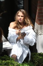 CARA DELEVINGNE on the Set of a Photoshoot in Toronto 05/16/2015