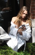CARA DELEVINGNE on the Set of a Photoshoot in Toronto 05/16/2015