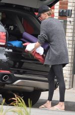 CHARLIZE THERON Arrives at Her Home in Los Angeles 05/25/2015