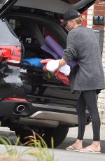 CHARLIZE THERON Arrives at Her Home in Los Angeles 05/25/2015