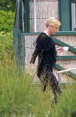 CHARLIZE THERON at Eden Roc Hotel in Cannes 05/13/2015