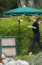 CHARLIZE THERON at Eden Roc Hotel in Cannes 05/13/2015