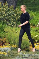 CHARLIZE THERON at Eden Roc Hotel in Cannes 05/13/2015