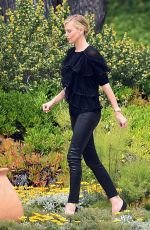 CHARLIZE THERON at Eden Roc Hotel in Cannes 05/13/2015