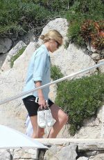 CHARLIZE THERON at Eden Roc Hotel Pool in Cannes