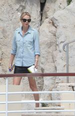 CHARLIZE THERON at Eden Roc Hotel Pool in Cannes