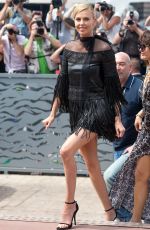CHARLIZE THERON at Mad Max: Fury Road Photocall in Cannes